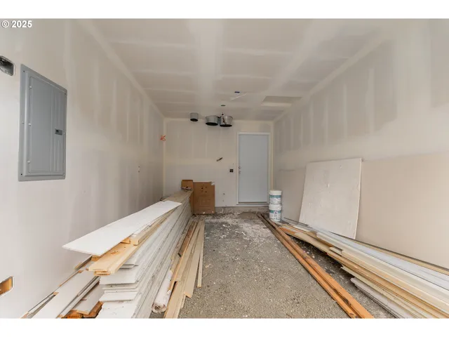 a view of a house with a yard and plants