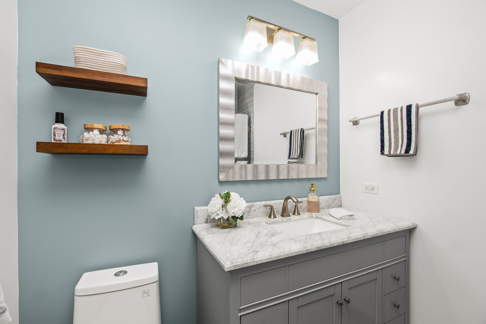 715 South Naperville Road Wheaton, IL 60189 - Photo 15 of 34 a bathroom with a granite countertop sink and a mirror