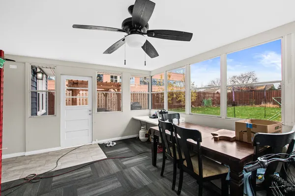 a view of a dining room with furniture window and outside view