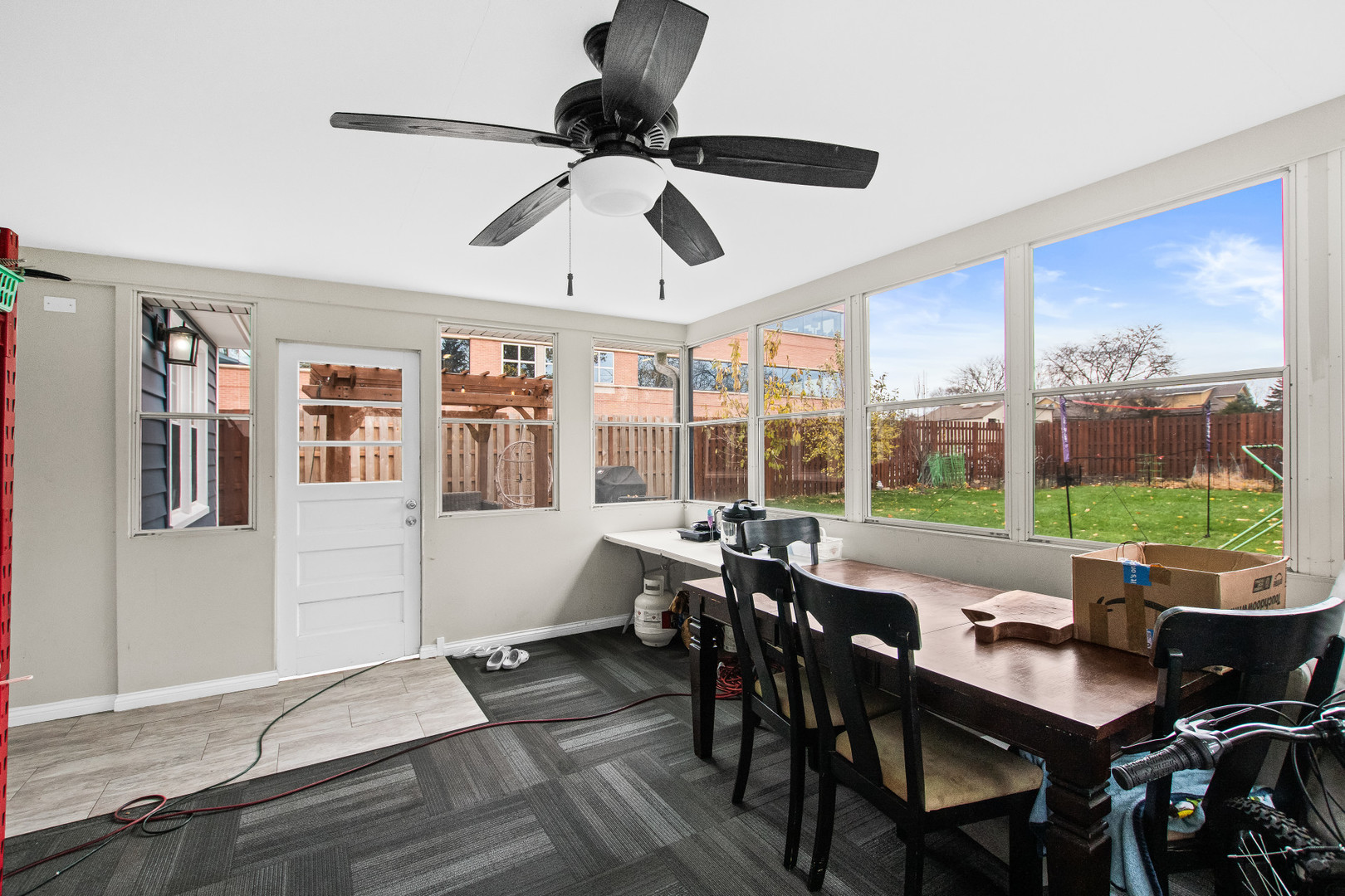 715 South Naperville Road Wheaton, IL 60189 - Photo 29 of 34 a view of a dining room with furniture window and outside view