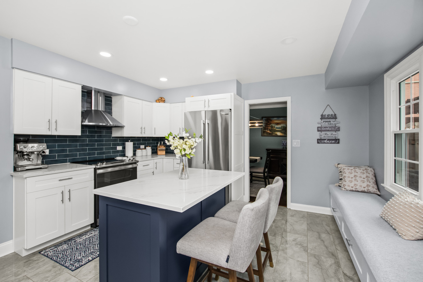 715 South Naperville Road Wheaton, IL 60189 - Photo 7 of 34 a large kitchen with a table and chairs
