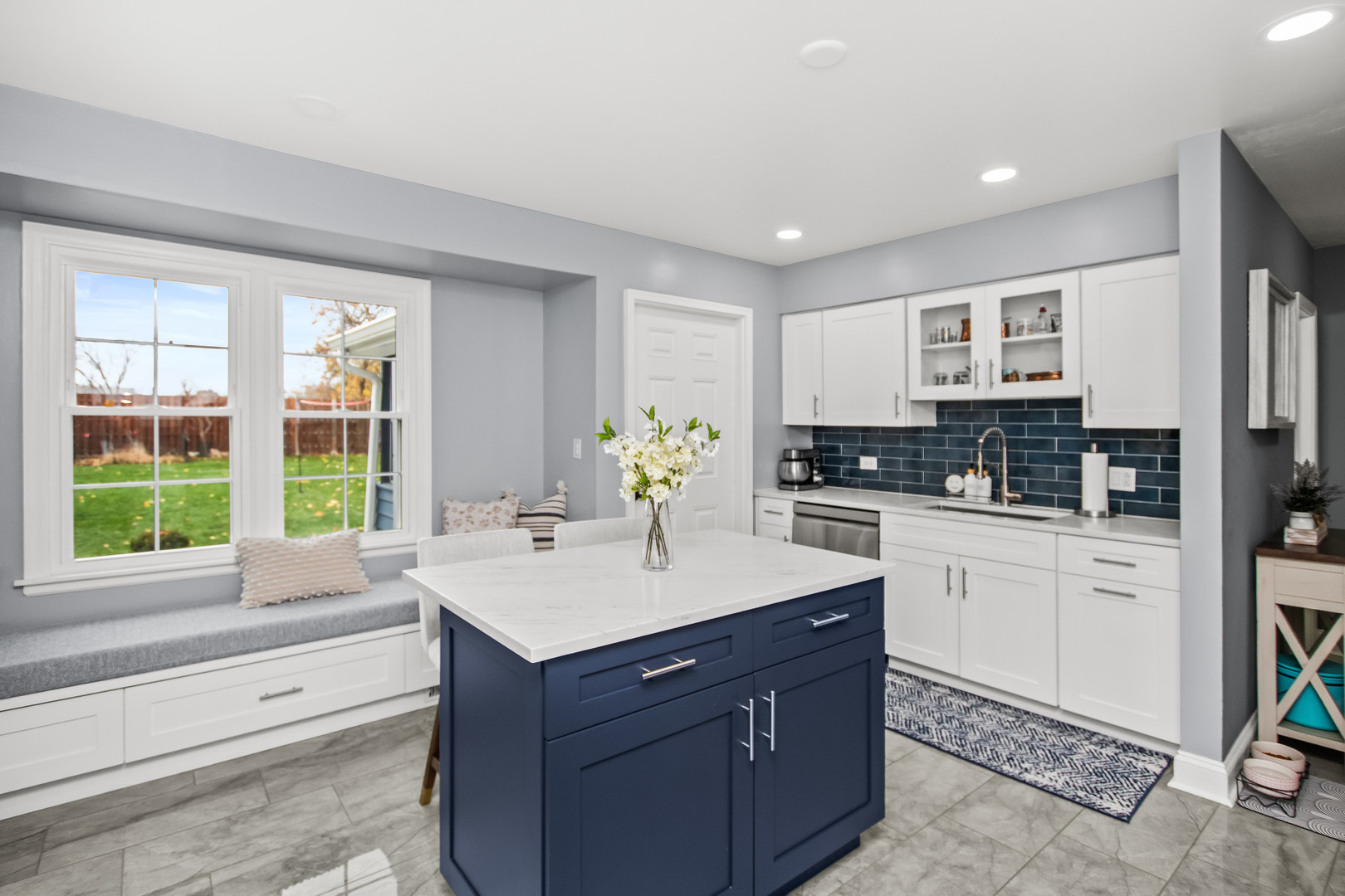 715 South Naperville Road Wheaton, IL 60189 - Photo 8 of 34 a kitchen with a sink stove and cabinets