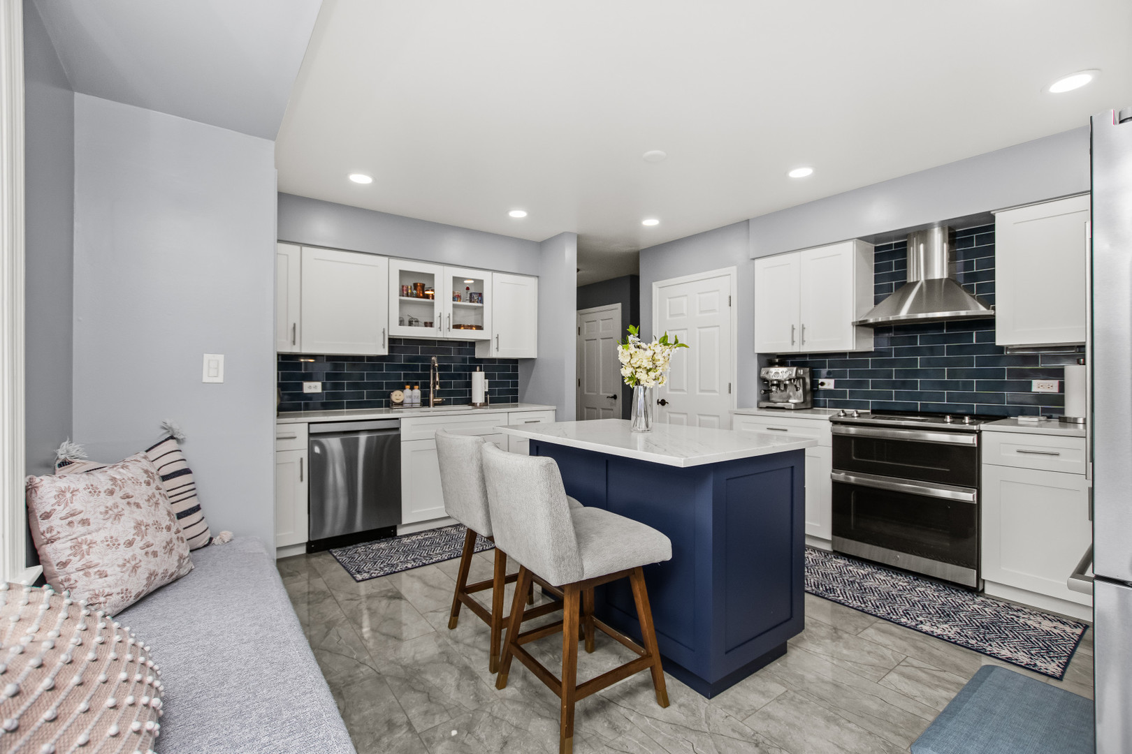 715 South Naperville Road Wheaton, IL 60189 - Photo 9 of 34 a kitchen with granite countertop a sink cabinets and stainless steel appliances