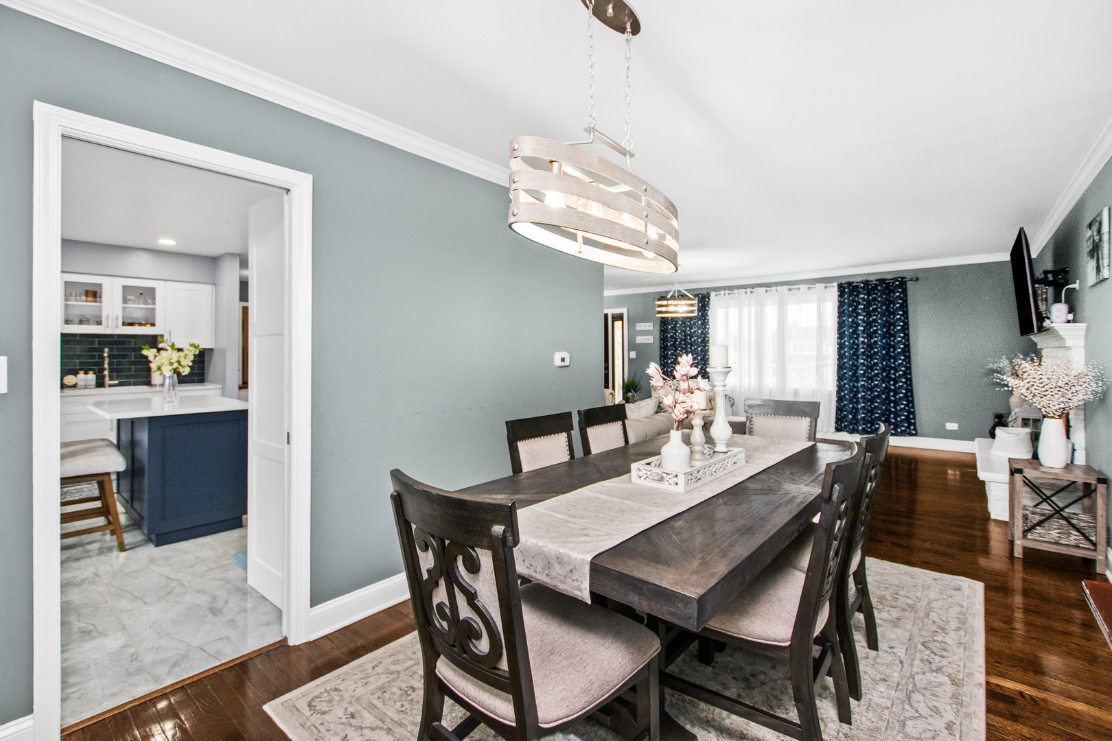 715 South Naperville Road Wheaton, IL 60189 - Photo 10 of 34 a view of a dining room with furniture and a chandelier