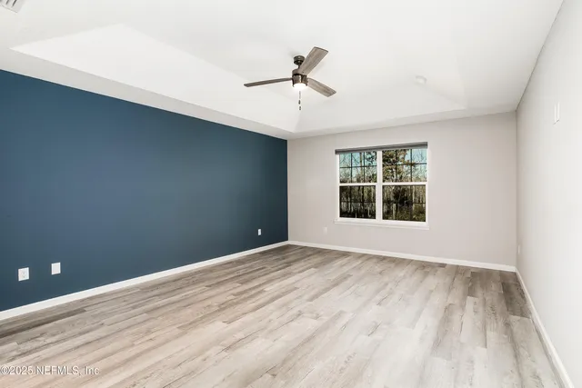 a kitchen with stainless steel appliances granite countertop a sink stove and microwave