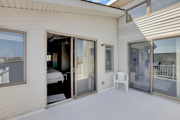 a bathroom with a tub shower and sink