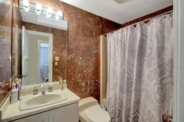 an outdoor sitting area with furniture and stove