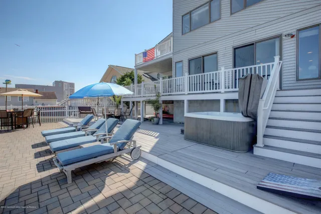 a view of a balcony with furniture