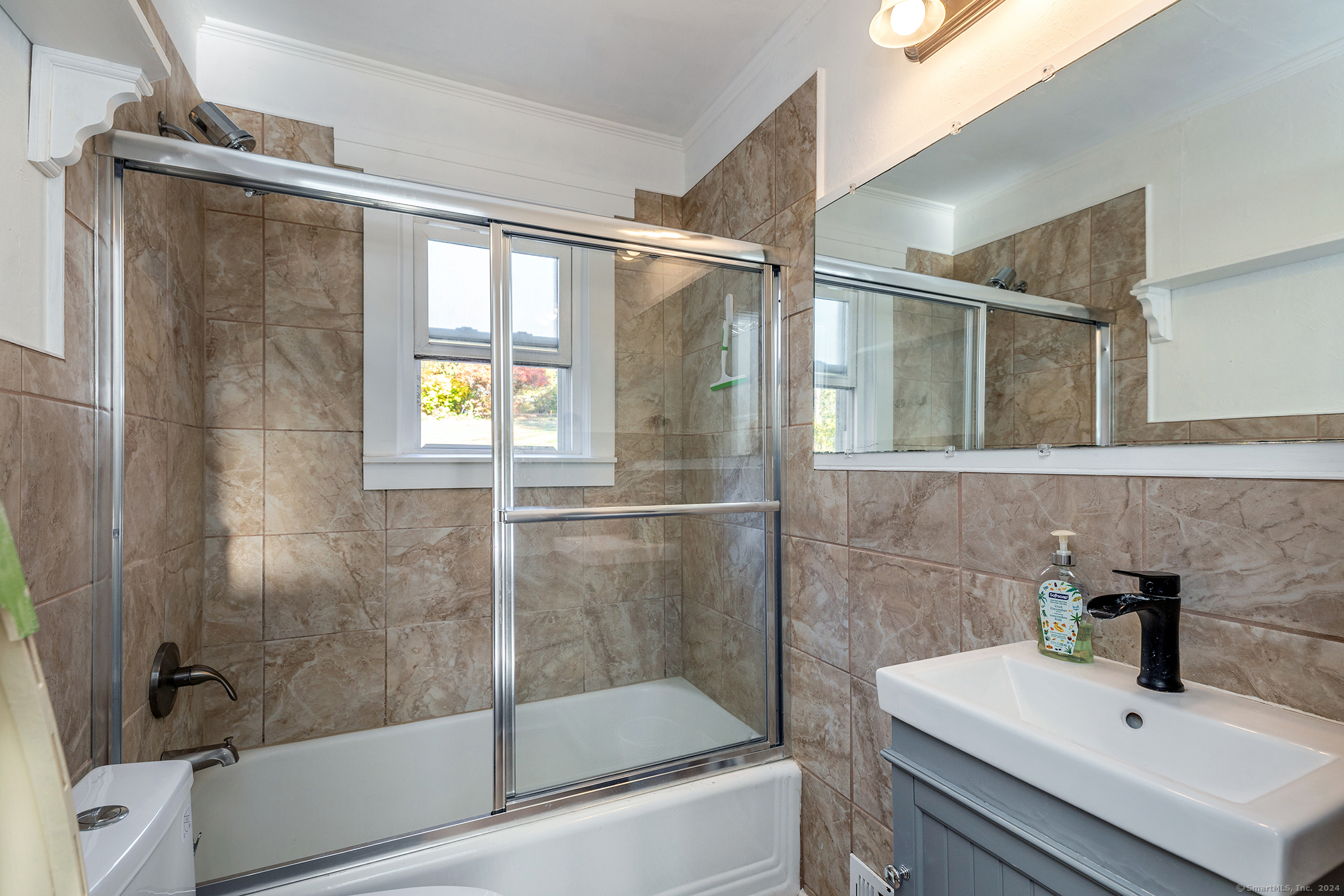 5 Windmill Road New Fairfield, CT 06812 - Photo 23 of 37 a bathroom with a shower and a sink