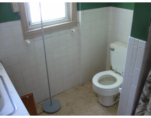 167 Allen Street Springfield, MA 01108 - Photo 15 of 22 a bathroom with a sink and a toilet
