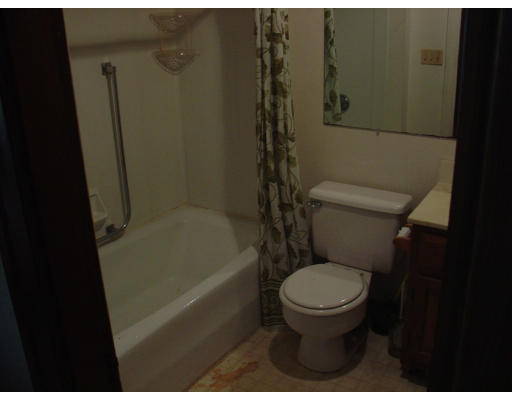 167 Allen Street Springfield, MA 01108 - Photo 10 of 22 a bathroom with a toilet and a shower