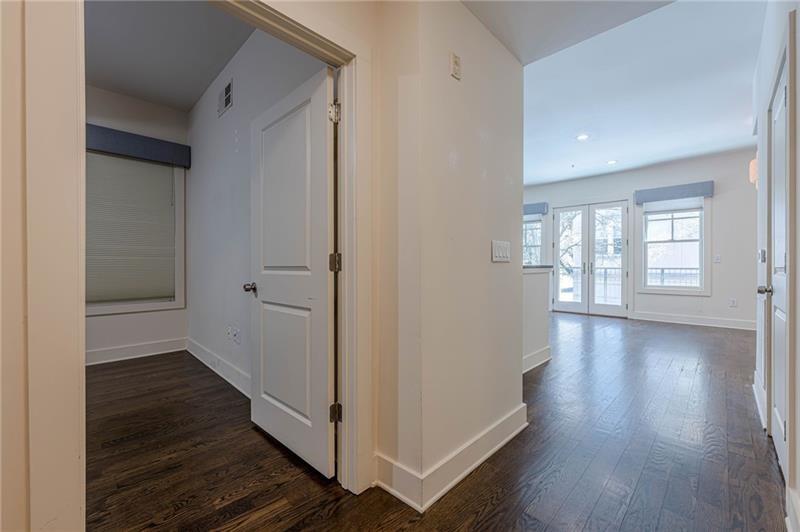 925 Garrett Street, Unit 215 Atlanta, GA 30316 - Photo 16 of 23 wooden floor in an empty room with a window