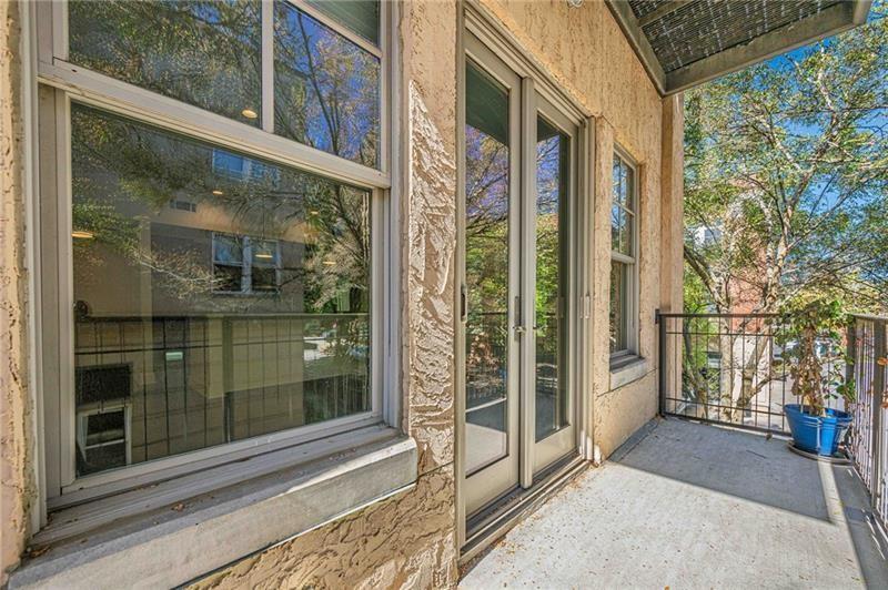925 Garrett Street, Unit 215 Atlanta, GA 30316 - Photo 18 of 23 a view of a balcony with a potted plant