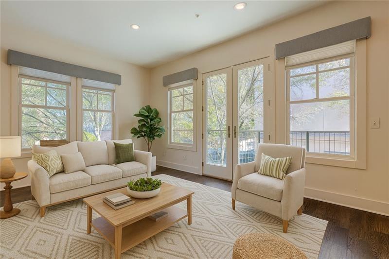 925 Garrett Street, Unit 215 Atlanta, GA 30316 - Photo 4 of 23 a living room with furniture and a large window