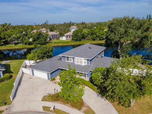 an aerial view of a house with a garden