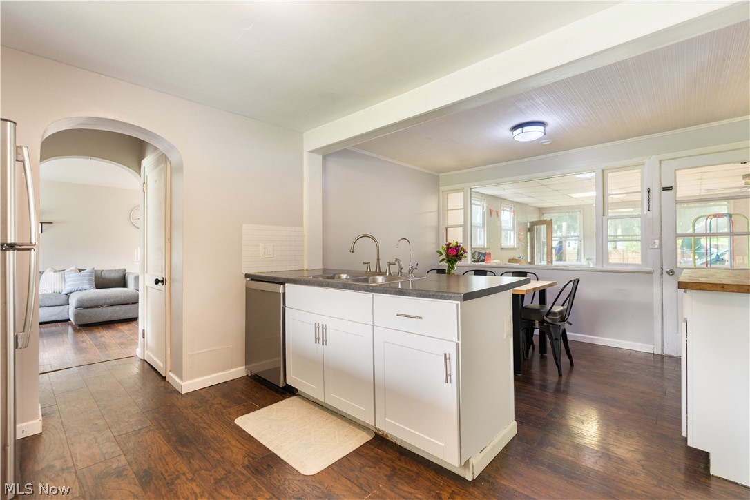 4644 16th Street Northwest Canton, OH 44708 - Photo 7 of 39 The kitchen features a separated dining area.