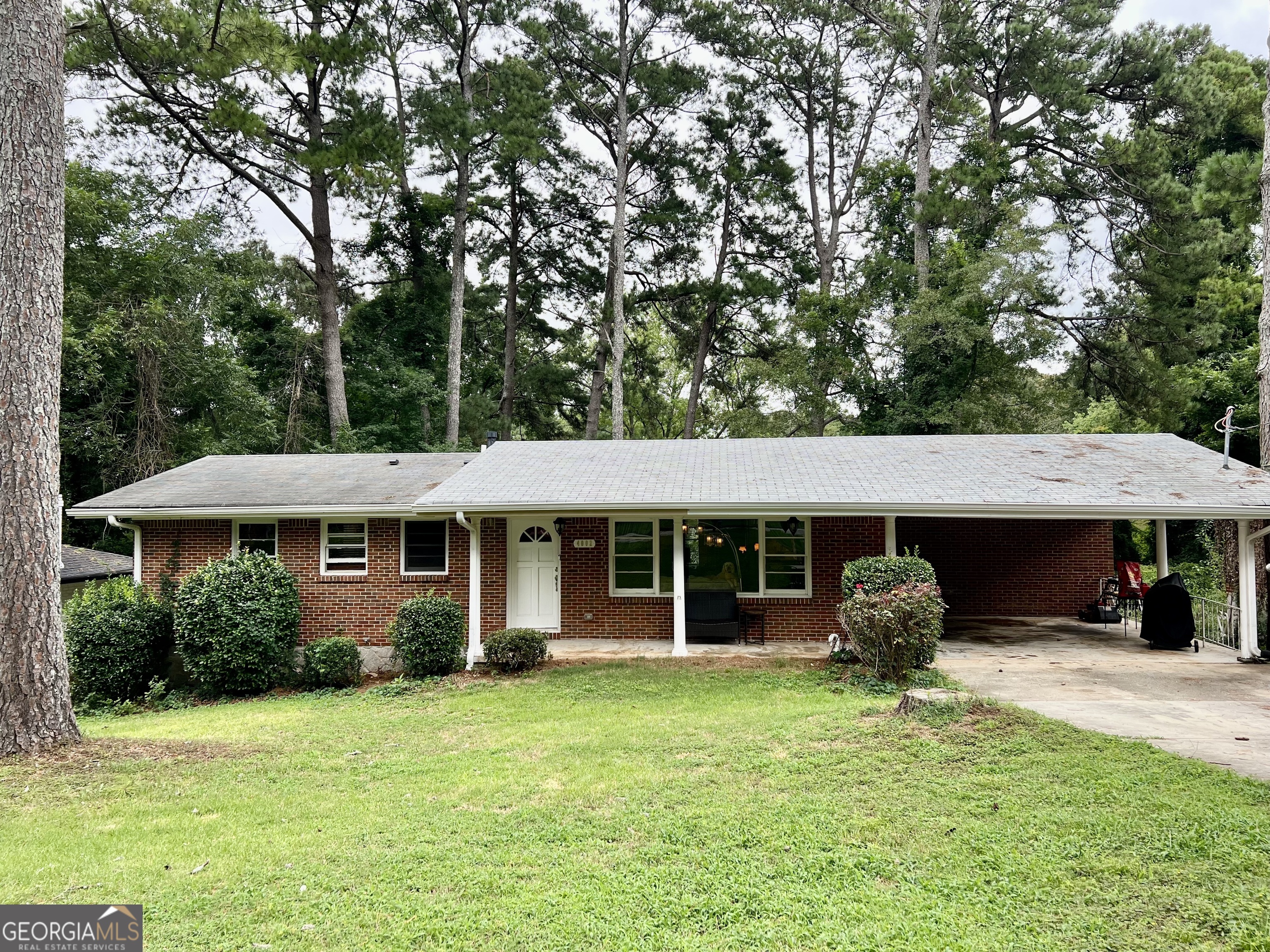 4002 East Hilda Circle Decatur, GA 30035 - Photo 1 of 1 a view of a house with a backyard