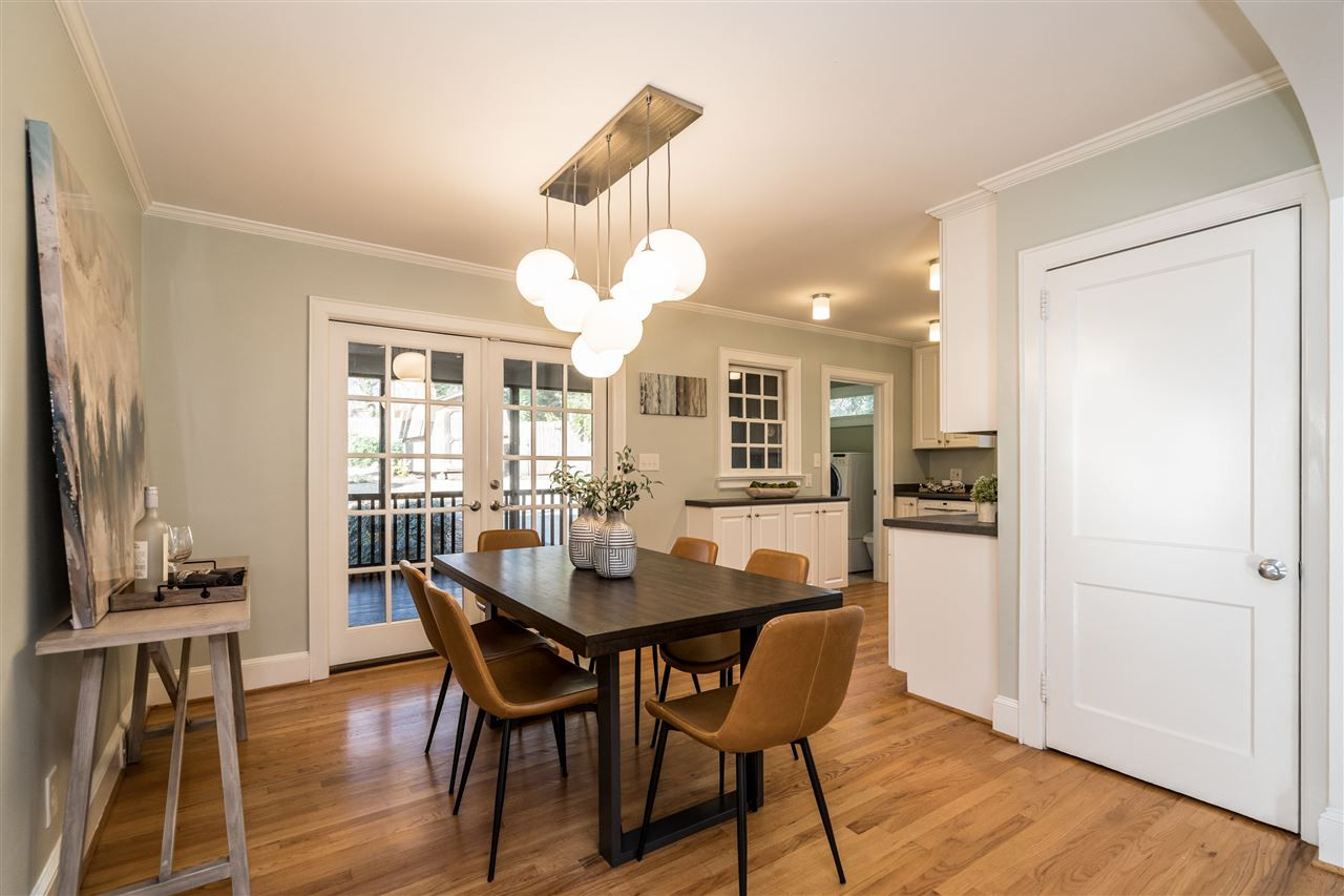 LOVE this dining room and hip chandelier! Dining Room