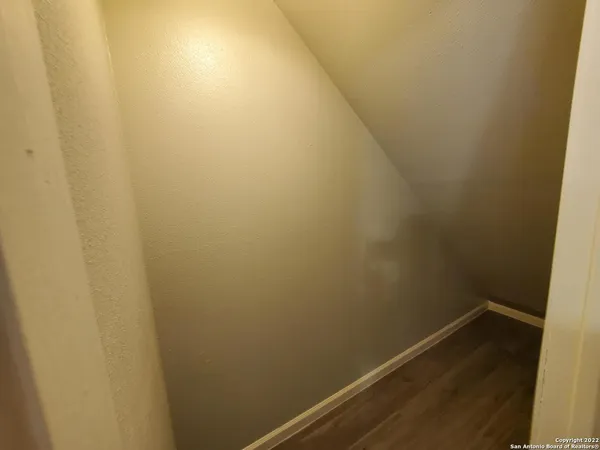 a view of small space with racks on the wall