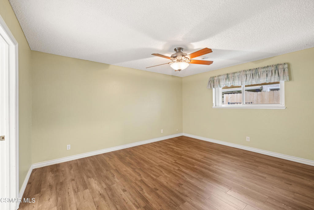2044 Covington Avenue Simi Valley, CA 93065 - Photo 18 of 32 wooden floor in an empty room with a window