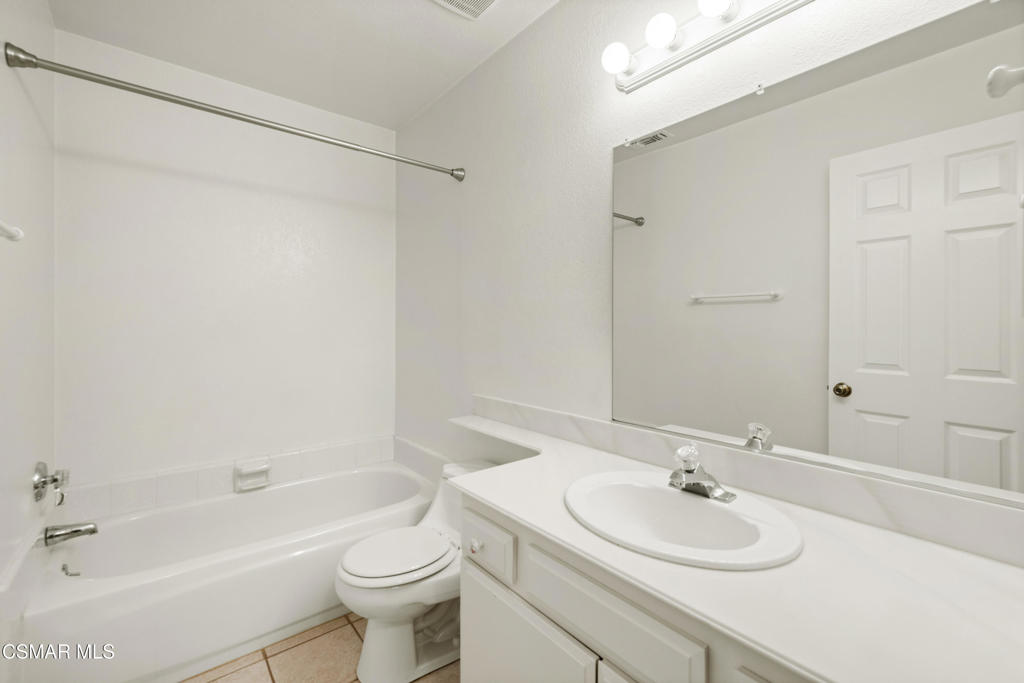 2044 Covington Avenue Simi Valley, CA 93065 - Photo 24 of 32 a bathroom with a sink toilet and shower