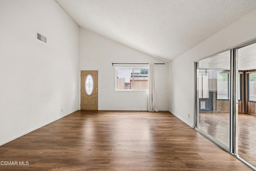 2044 Covington Avenue Simi Valley, CA 93065 - Photo 8 of 32 a view of an empty room with glass door