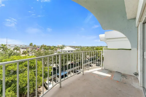 a view of a balcony with city view