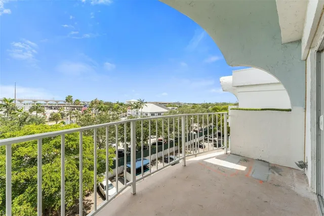 a view of a balcony with city view