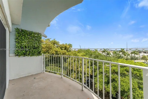 a view of a balcony with an outdoor space