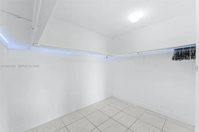 a view of an empty walk in closet