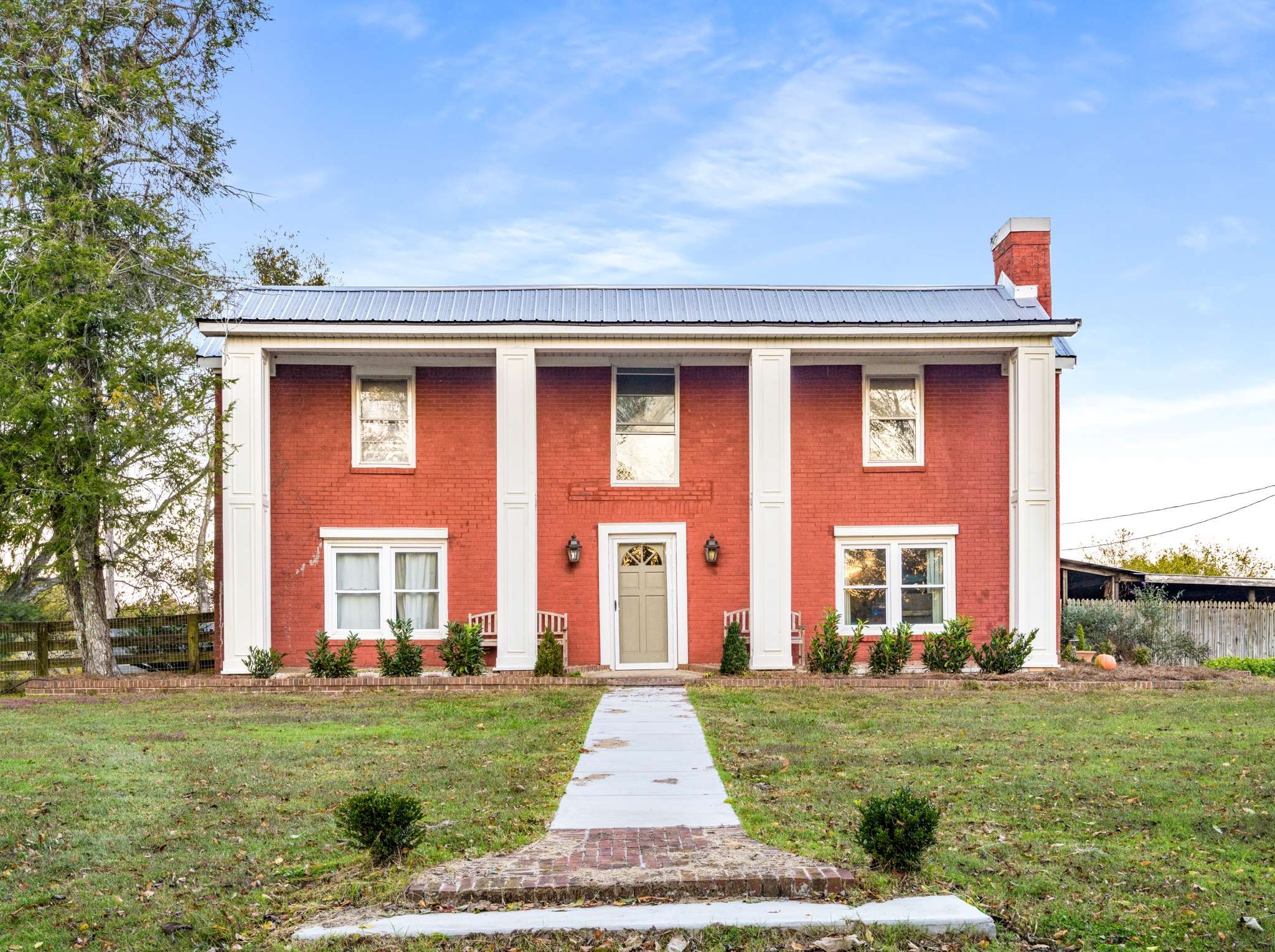 683 Johnson Branch Road Williamsport, TN 38487 - Photo 28 of 62 a front view of a house with a yard