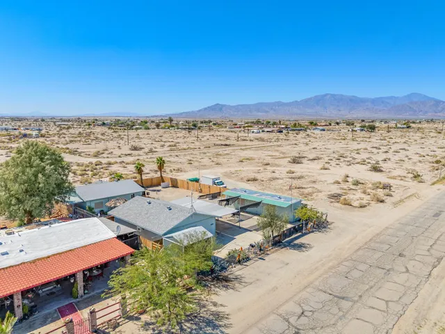 an aerial view of beach and ocean