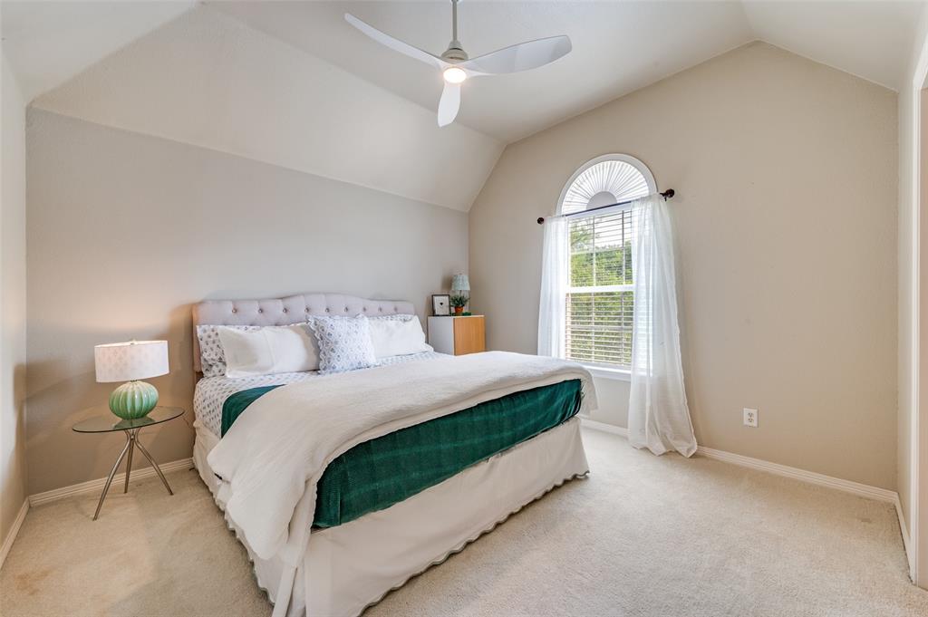 2841 Winding Creek Road Prosper, TX 75078 - Photo 28 of 40 a bedroom with a bed and window