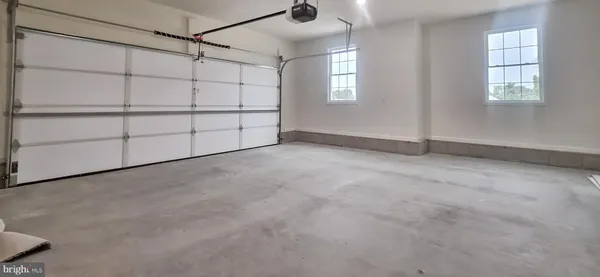 a picture of a bathroom with a shower