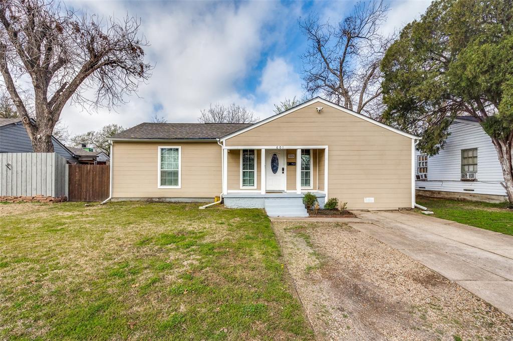 601 Sylvan Drive Garland, TX 75040 - Photo 1 of 1 a house with trees in the background