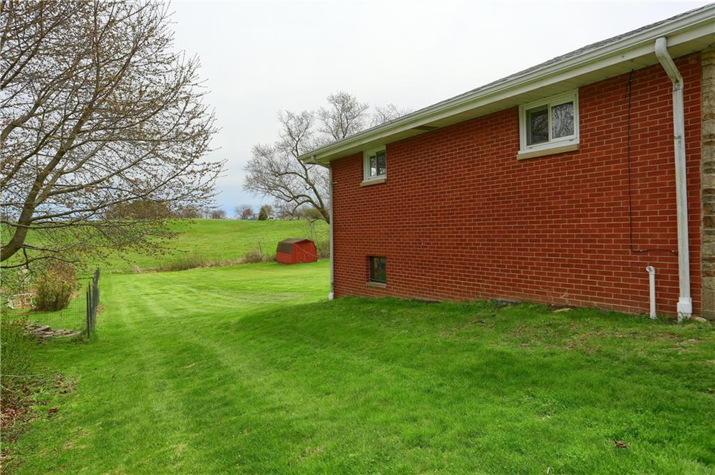 1022 Mercer Road Beaver Falls, PA 15010 - Photo 3 of 16 side of house view to back yard and field