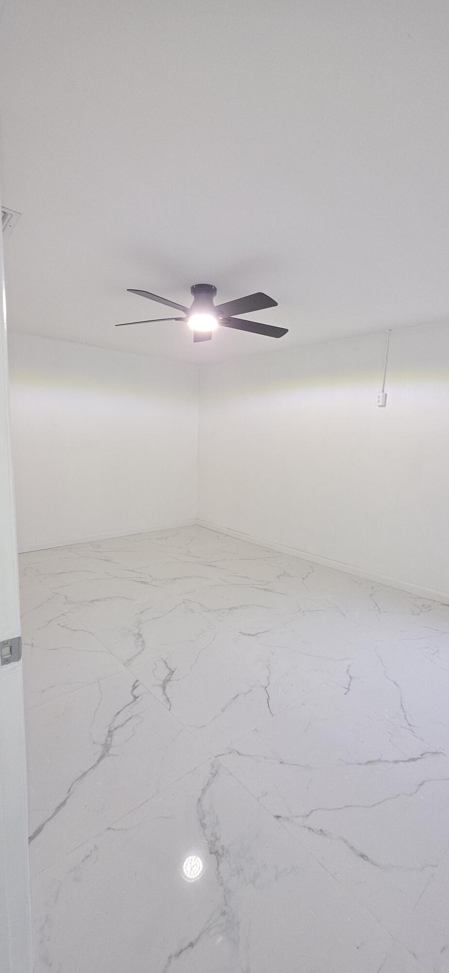 7112 Pine Manor Drive Lake Worth, FL 33467 - Photo 25 of 32 a view of a closet with wooden floor