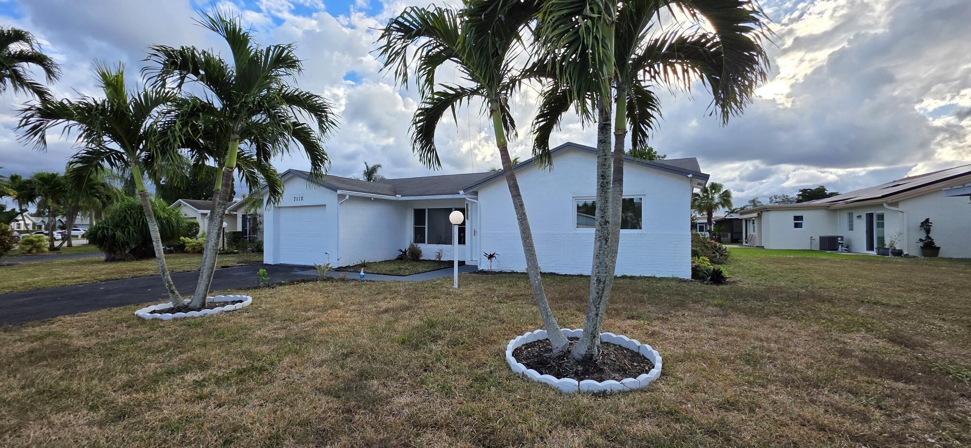 7112 Pine Manor Drive Lake Worth, FL 33467 - Photo 3 of 32 20260109_161211_resized (1)