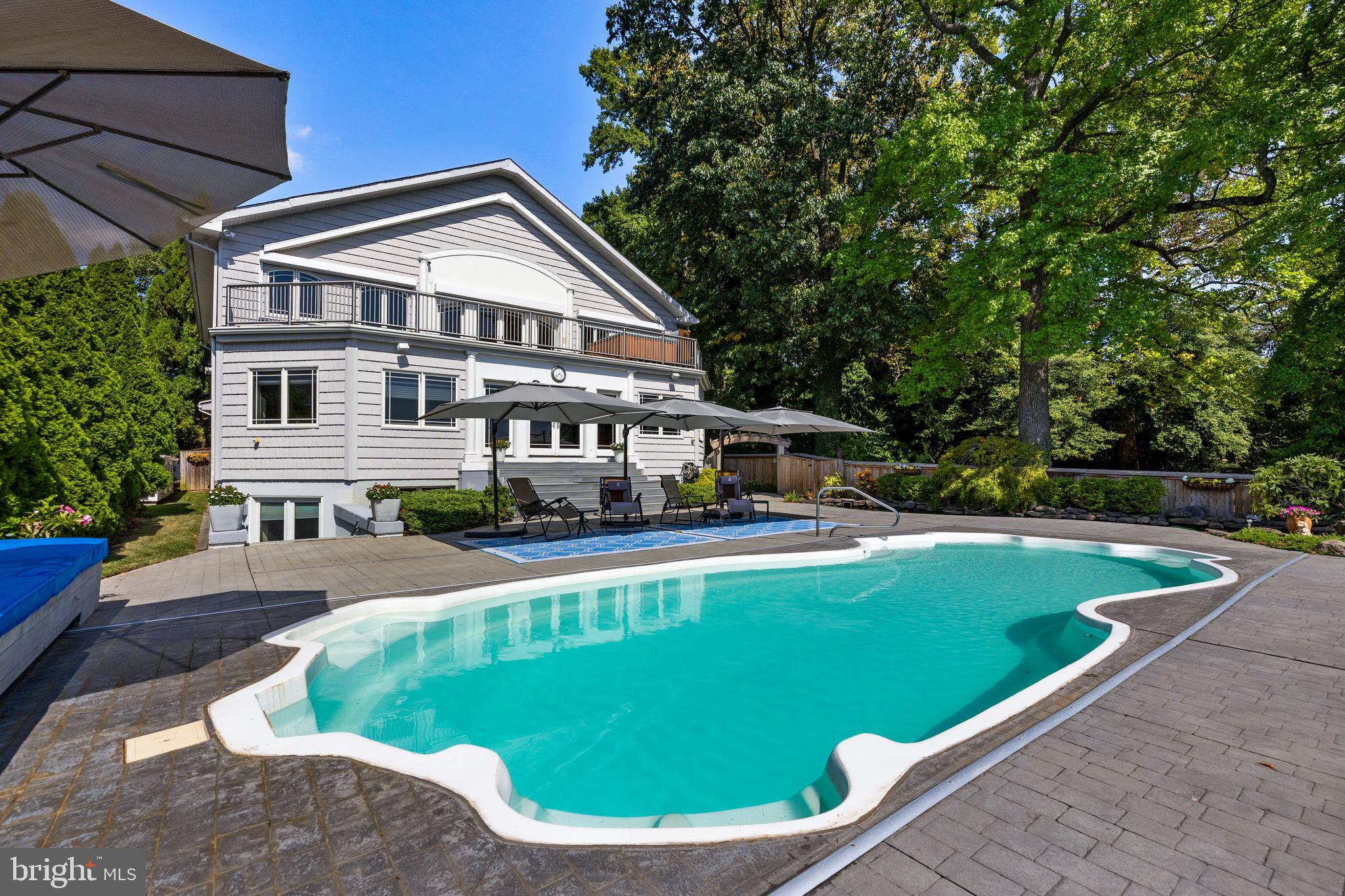 1501 Shore Road Middle River, MD 21220 - Photo 2 of 81 Heated saltwater pool with retractable cover