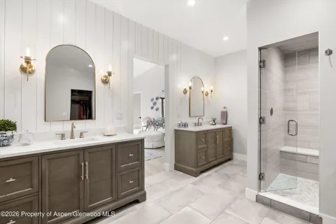 a white bath tub sitting in a bathroom