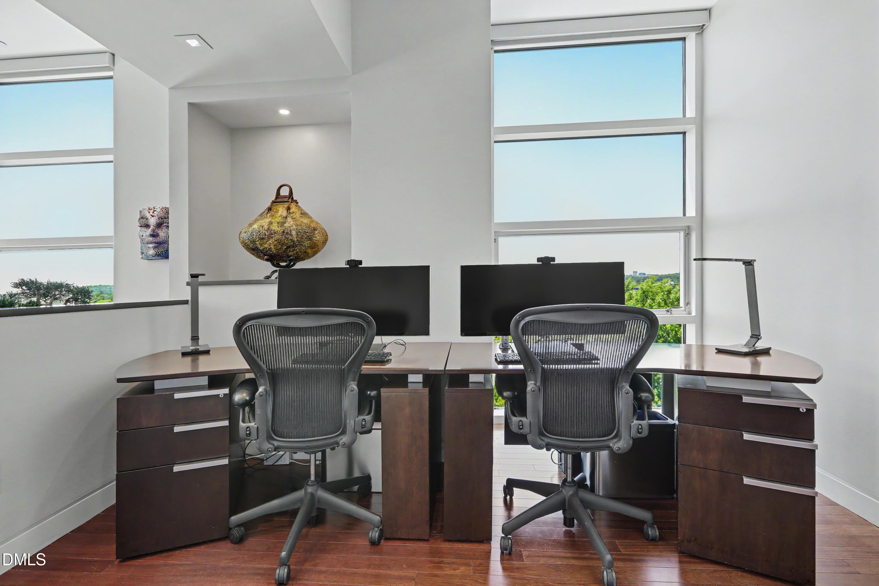 331 West Barbee Chapel Road Chapel Hill, NC 27517 - Photo 37 of 92 a view of a workspace with furniture and wooden floor