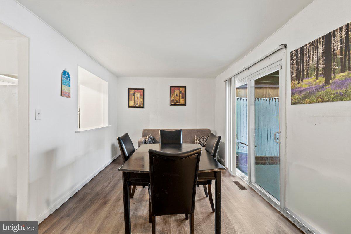 49 Fairmount Drive Willingboro, NJ 08046 - Photo 19 of 19 a view of a dining room with furniture window and wooden floor