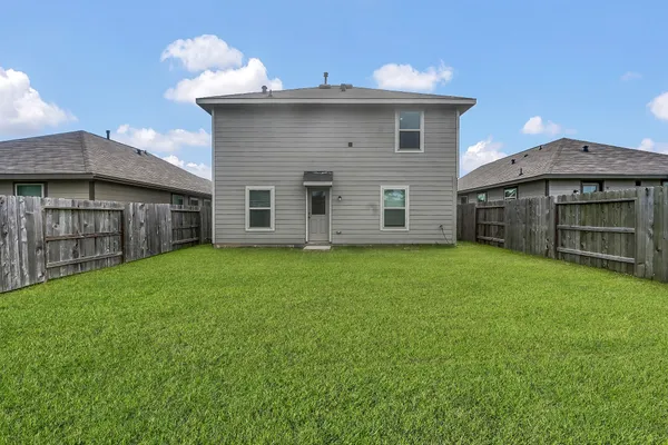 a view of a backyard with a garden