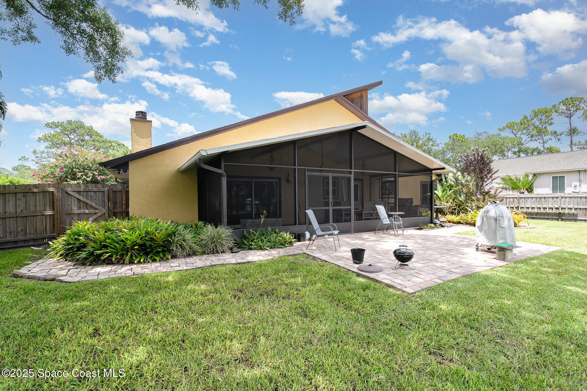 2515 Fairfield Drive Cocoa, FL 32926 - Photo 20 of 31 a view of a house with backyard and sitting area