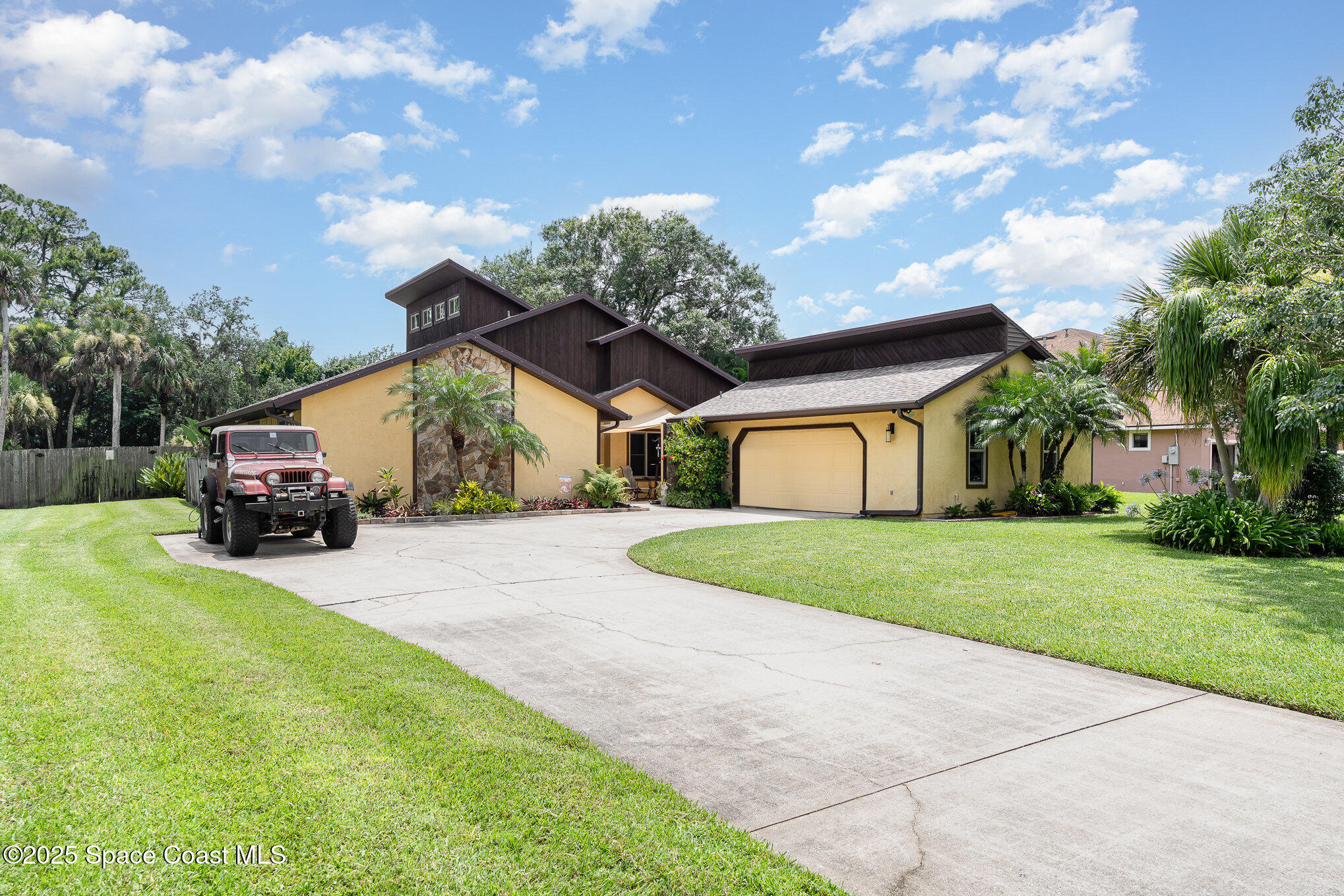 2515 Fairfield Drive Cocoa, FL 32926 - Photo 2 of 31 a view of a house with a back yard
