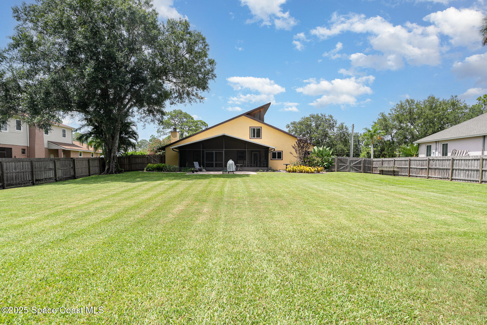 2515 Fairfield Drive Cocoa, FL 32926 - Photo 22 of 31 a front view of house with yard and green space