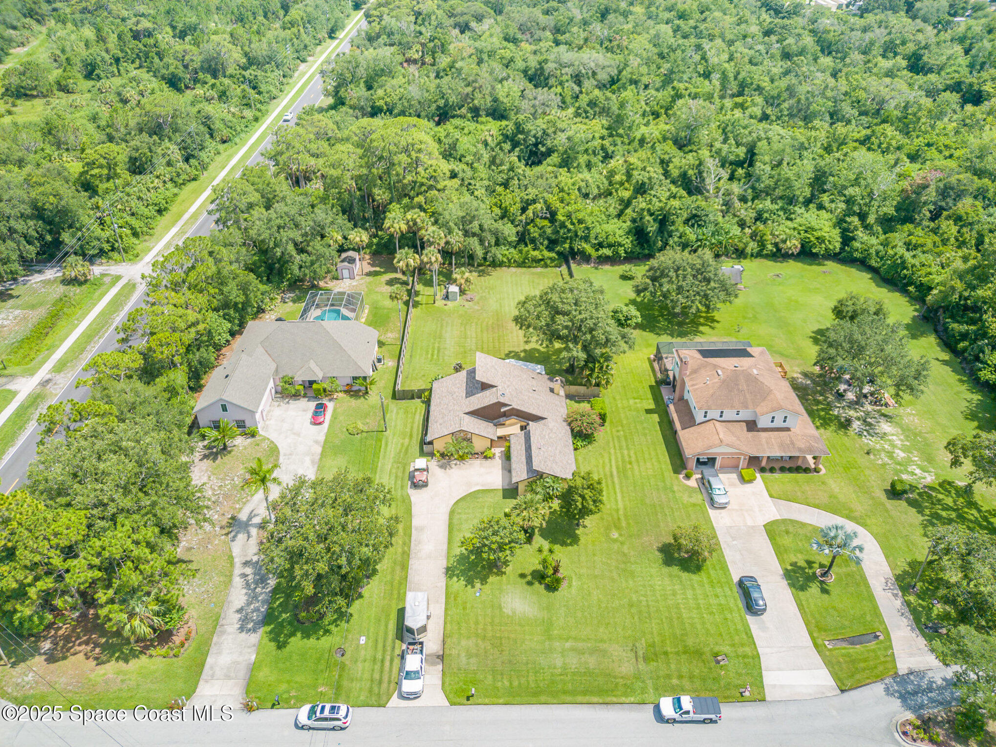 2515 Fairfield Drive Cocoa, FL 32926 - Photo 23 of 31 an aerial view of residential houses with outdoor space and street view
