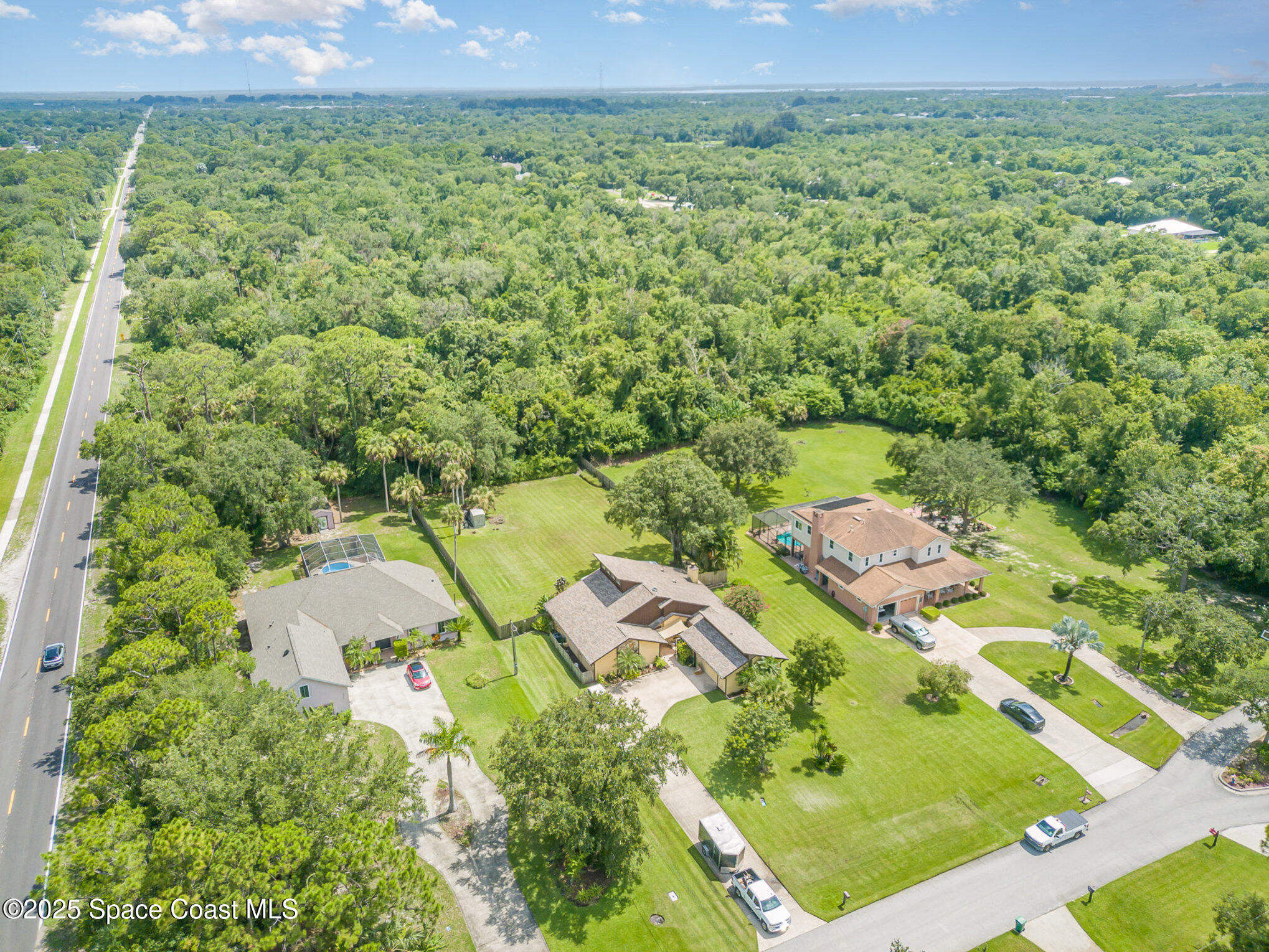 2515 Fairfield Drive Cocoa, FL 32926 - Photo 25 of 31 a view of a garden with an outdoor space