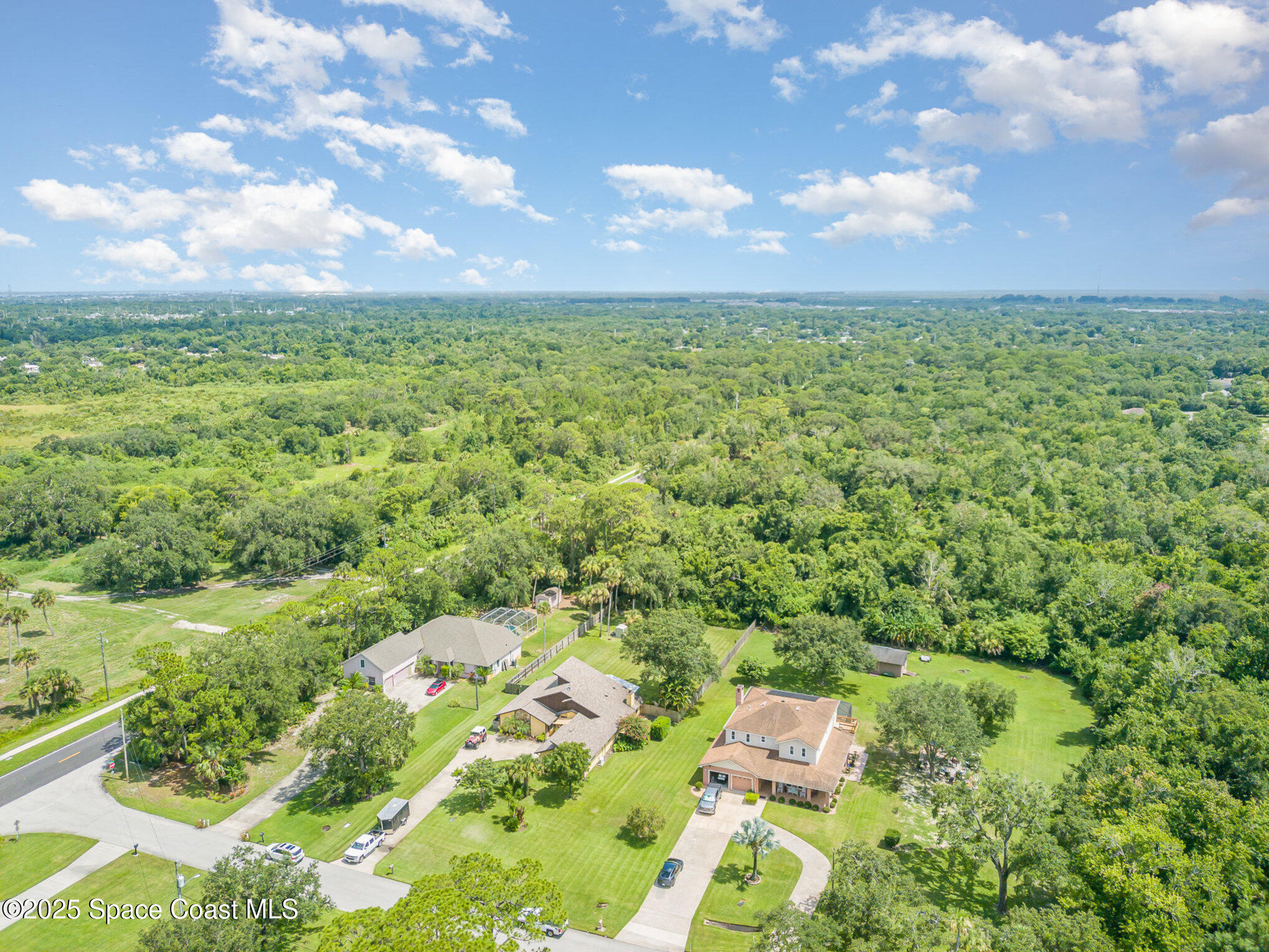 2515 Fairfield Drive Cocoa, FL 32926 - Photo 26 of 31 a aerial view of a houses with yard