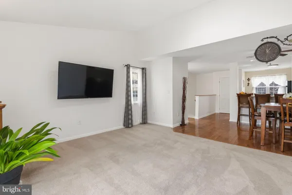 a view of livingroom with furniture and flat screen tv